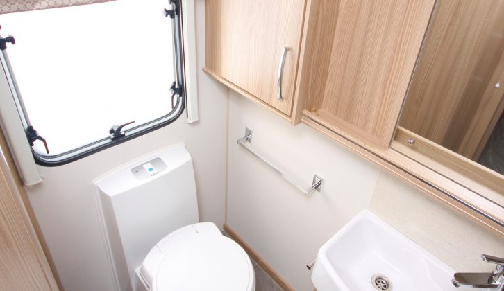 The electric-flush loo (with an opaque window) sits in the offside rear corner, next to the good-sized sink