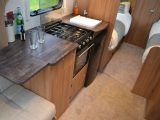 The 550-4 has twin fixed single beds, a central kitchen and an end washroom
