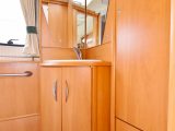 The Swift Challenger 460's rear washroom has a circular shower cubicle and impressive storage