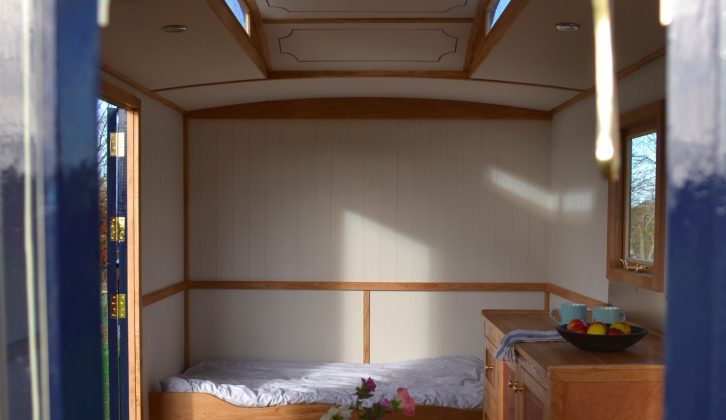 High-level, slit-like windows in the mollycroft roof help fill this bespoke caravan with light
