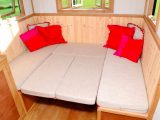 Use the existing seat cushions to make up the double bed at the rear