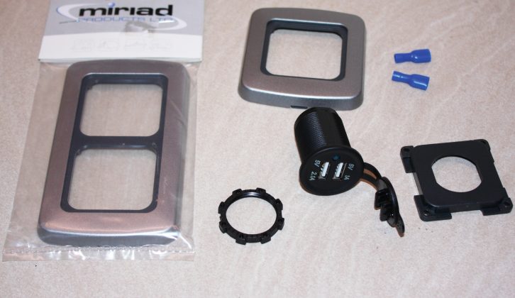 The USB socket kit and fittings as supplied, plus an aftermarket double socket surround