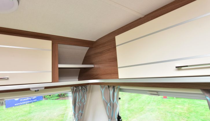 The furniture finish is contemporary, with overhead lockers that have ample storage space