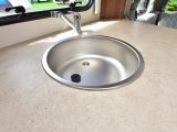 The circular sink has a clip-on drainer and there's a decent amount of worktop space