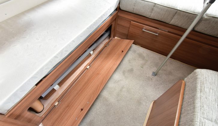 Under-bunk and under-seat storage at the rear is very useful in this family caravan