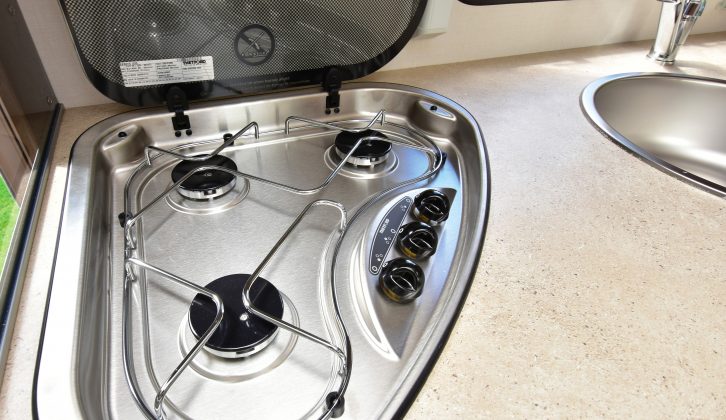 There's also a three-burner gas hob with a hinged cover and a splashguard