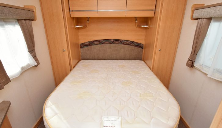 The end bedroom in the 545/4 is a good size and comes with plenty of storage, plus the mattress on this island bed looked little-used