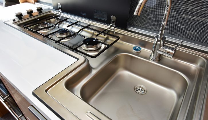 The combined sink/hob layout is an Adria trait and brilliantly functional, but at this price we'd expect four burners and, ideally, a dual-fuel hob