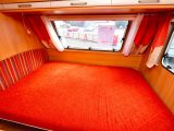 A front fixed bed is unusual, but the Caravelair's is a good size, with decent overhead storage – and bonus under-bed storage