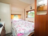 ...the vintage caravan's second double bed folds down there!
