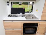 The end-kitchen in this Adria caravan may be compact, but it is well-equipped