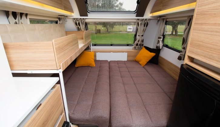 The 2.14m x 1.8m front double bed can accommodate three, while the 0.58m x 1.71m bunk has a 50kg weight limit