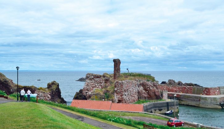 The ruins of Dunbar Castle hang precariously over Dunbar Harbour – read more as we visit Scotland this month