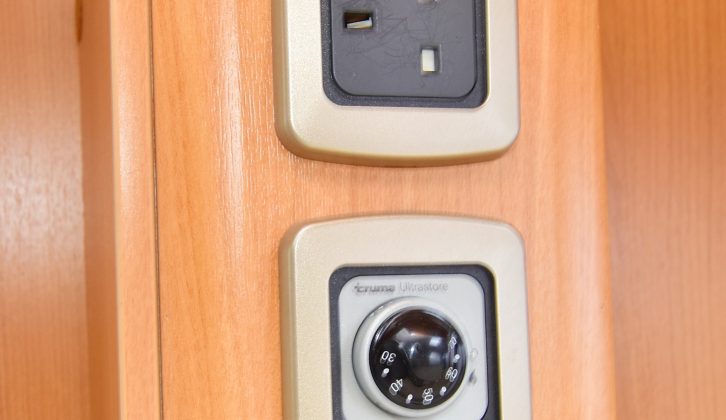 Two mains sockets and heating controls are handily positioned in the kitchen at the back of the dresser