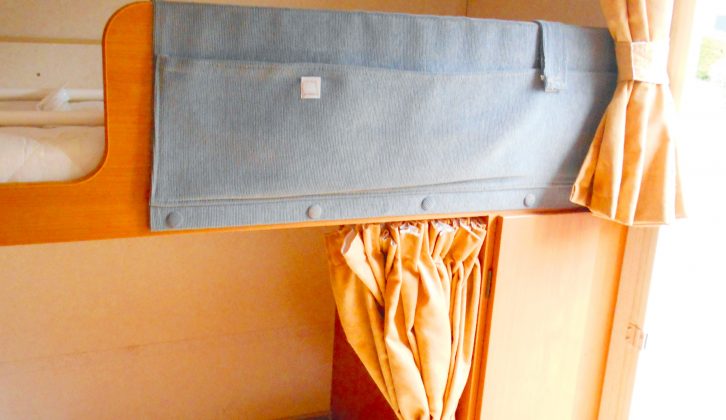 This DIY solution means there are two curtains, each neatly tied back