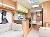 The extra-long skylight ensures that the lounge and kitchen areas of this Lunar caravan are flooded with light