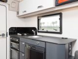 The smart kitchen gets a Dometic fridge and a three-burner hob – the oven and grill come as part of the £595 Plus pack