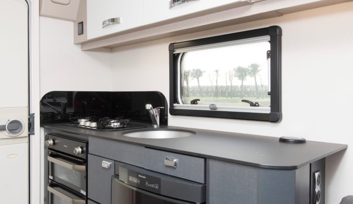 The smart kitchen gets a Dometic fridge and a three-burner hob – the oven and grill come as part of the £595 Plus pack