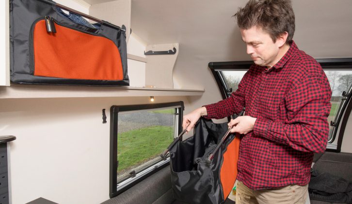 The removable overhead baskets have zipped fronts and are a great idea – read more in the Practical Caravan Swift Basecamp Plus review