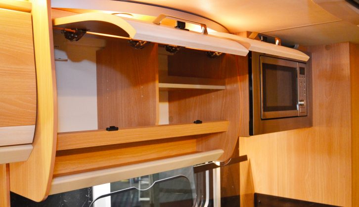 Alongside the sturdy and spacious overhead lockers, the Knaus StarClass 480’s kitchen also includes a microwave oven