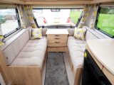 That large, single-pane front window lets light flood into the good-sized lounge