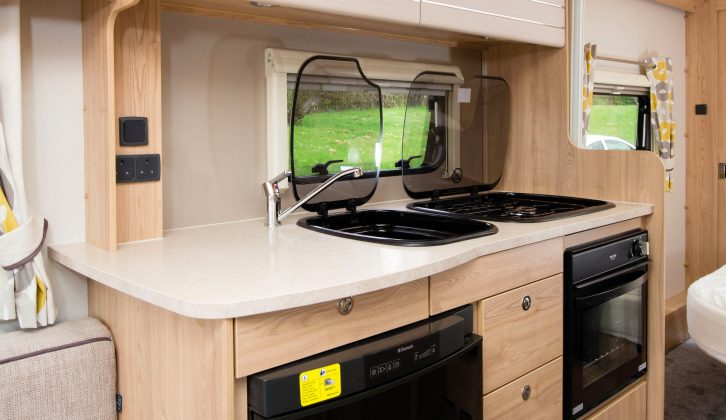There's no worktop extension flap, but the sink and hob have glass lids which will give cooks more space