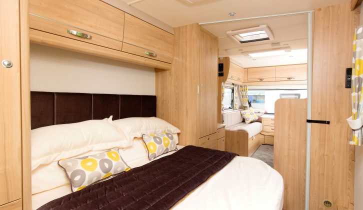 You’ll need to fit your own stand, but there are all the points you need on the kitchen bulkhead for another TV