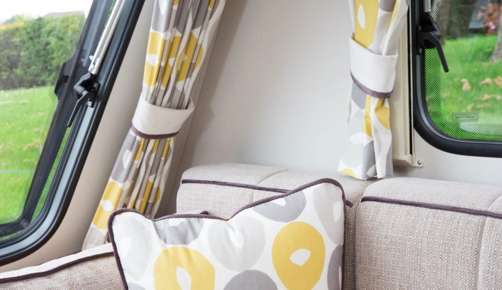 The cheerful yellow and oatmeal/grey fabrics give the lounge a fresh, bright, contemporary ambience