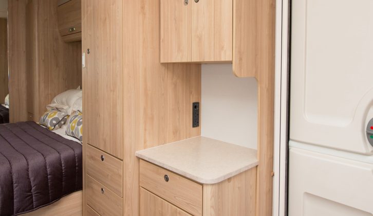 Extra storage is opposite the kitchen, and this is a great place for your TV