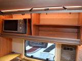Up above, next to the Amica microwave, is further storage space – read more in the Practical Caravan Hymer Nova GL 470 review