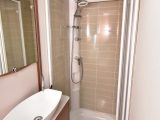 The shower cubicle almost looks like something you would find at home thanks to the tiled effect – and you only need one drainhole in this self-levelling van