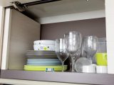 The overhead lockers in the Caravelair Antarès 476's kitchen are spacious enough for crockery and glasses