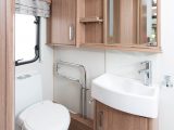 It's light and bright in the washroom of this Coachman caravan, with a decent amount of storage