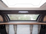 A rooflight and a massive sunroof, plus the use of pale fabrics, means the 2017 Coachman VIP 565 has a lovely, light lounge