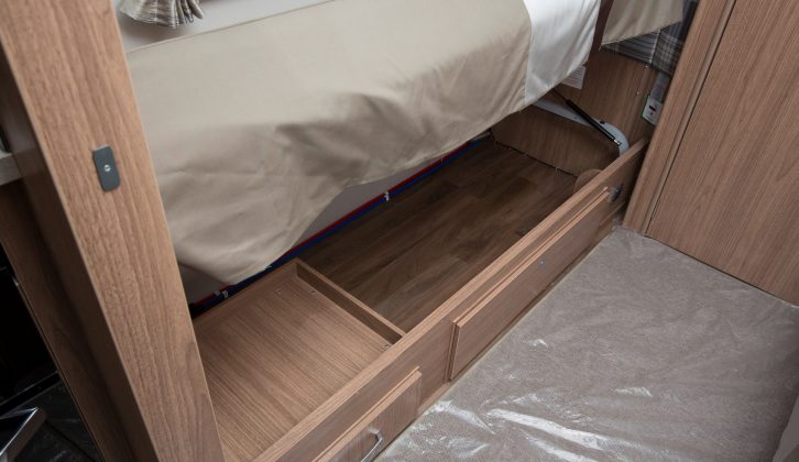 The bed bases rise on gas struts, permitting easy access to the space below – there's a flap and a drawer, too