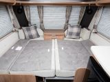 The front make-up double bed is 2.03m x 1.16m – or they could be used as 1.52m x 0.72m singles