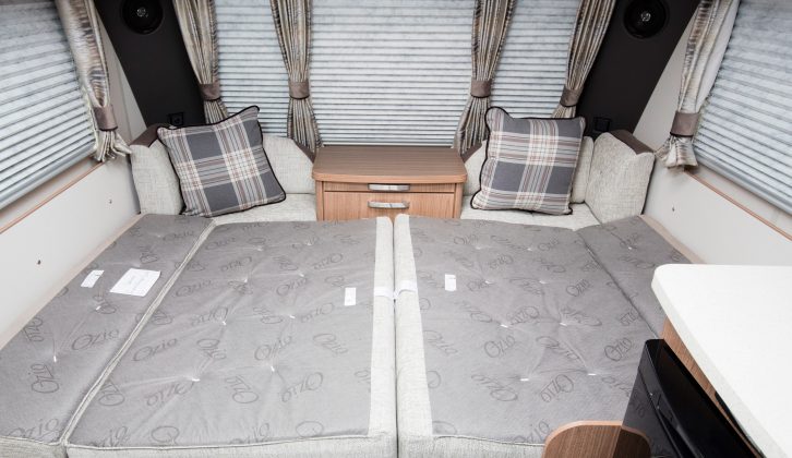 The front make-up double bed is 2.03m x 1.16m – or they could be used as 1.52m x 0.72m singles