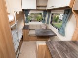 The three-seater rear dinette in this Bailey caravan is a great place for kids to play or enjoy a meal