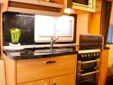 A large sink and drawer are the icing on the cake for chef in this well-equipped caravan kitchen