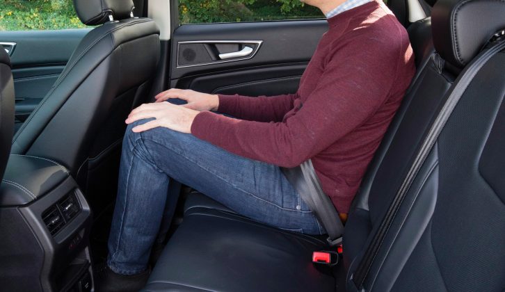 Three adults can travel comfortably in the back seats of the Ford Edge