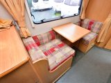 The Champagne's side single dinette – which can also be made up into twin bunks – features a large window