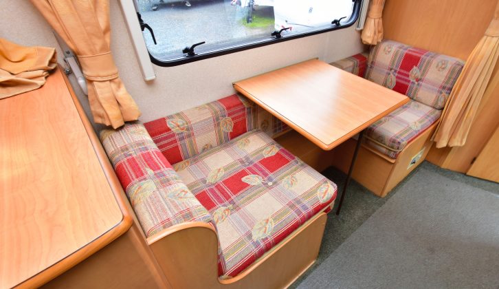 The Champagne's side single dinette – which can also be made up into twin bunks – features a large window