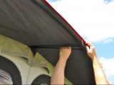 The caravan awning’s canopy takes fixing poles for extra rigidity