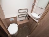 The wheelarch in the central washroom has been squared off to create a useful shelf beneath the heated towel rail