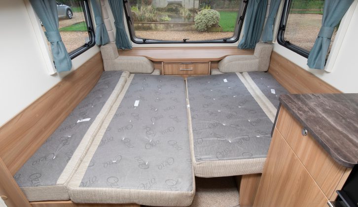 Use the sofas as single beds (the nearside is 1.77m x 0.67m, the offside 1.55m x 0.67m), or make them up into a 2.03m x 1.46m double