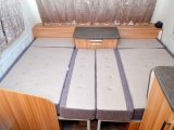 It's easy to put the front make-up double bed together and it measures 2.10m x 1.53m