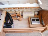 The offside seat base holds the consumer unit and water heater, but there is still space left to store some bedding