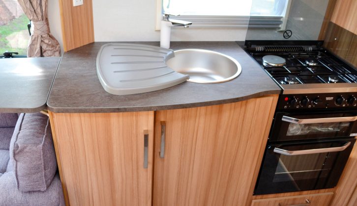 Cooks will appreciate the separate oven and grill and dual-fuel hob, while those on food-preparation duties will be thankful for the excellent worktop space