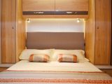 The Elddis Crusader Zephyr's rear bedroom is a very luxurious space, with spotlights, a wardrobe and a shelf for each bed occupant