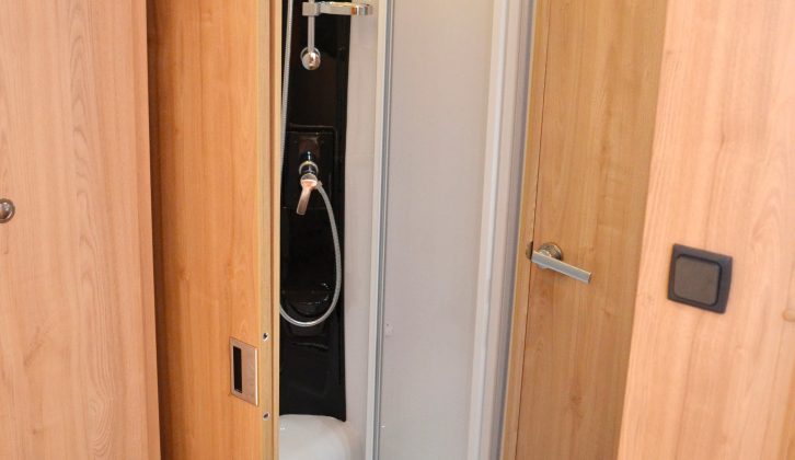 There is a step to get into the shower cubicle, and it is not as large as it could be, but you do get an EcoCamel showerhead and a funky-looking riser